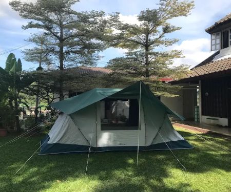 Ready set up tent in the gated garden, private property