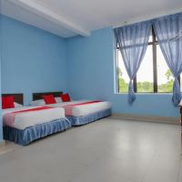 OYO 90174 Tuah Inn ico