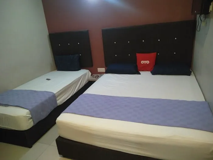 Super OYO Capital O 90556 Hotel Cherita Rooms Picture 6