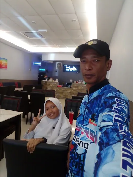 Super OYO Capital O 90556 Hotel Cherita Rooms Picture 10