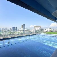 OYO Home 990 Modish 1BR Avenue D' Vogue ico